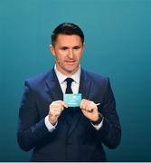 2 December 2018; Republic of Ireland assistant coach Robbie Keane draws out  during the UEFA EURO2020 Qualifying Draw at the Convention Centre in Dublin. Photo by Sam Barnes/Sportsfile
