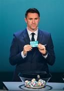 2 December 2018; Republic of Ireland assistant coach Robbie Keane draws out Montenegro during the UEFA EURO2020 Qualifying Draw at the Convention Centre in Dublin. Photo by Sam Barnes/Sportsfile