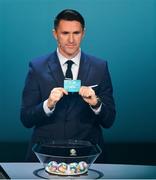 2 December 2018; Republic of Ireland assistant coach Robbie Keane draws out Latvia during the UEFA EURO2020 Qualifying Draw at the Convention Centre in Dublin. Photo by Sam Barnes/Sportsfile