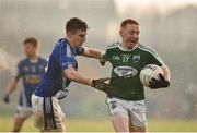 2 December 2018; James Carroll of Gaoth Dobhair in action against Jack McDevitt of Scotstown during the AIB Ulster GAA Football Senior Club Championship Final match between Gaoth Dobhair and Scotstown at Healy Park in Tyrone. Photo by Oliver McVeigh/Sportsfile