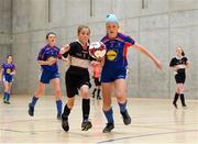 4 December 2018; Cara King of St. Attracta's Community School, Tubbercurry, Sligo, in action against Sarah Bell of Ursuline Secondary School, Thurles, Tipperary, during the Post-Primary Schools National Futsal Finals match between St. Attracta's Community School, Tubbercurry, Sligo and Ursuline Secondary School, Thurles, Tipperary, at Waterford IT Sports Arena in Waterford. Photo by Eóin Noonan/Sportsfile