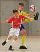 4 December 2018; Ronan Clarke of St. Louis Community School, Kiltimagh, Mayo, in action against Conor McGinty of St. Columba's College, Stranorlar, Donegal, during the Post-Primary Schools National Futsal Finals match between St. Louis Community School, Kiltimagh, Mayo and St. Columba's College, Stranorlar, Donegal at Waterford IT Sports Arena in Waterford. Photo by Eóin Noonan/Sportsfile