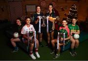 4 December 2018; In attendance, from left, Nicole Rooney of Emmet Óg and Sarah Murphy of Clontarf with the Ladies All-Ireland Intermediate Club Trophy, Amy Ring, captain of Foxrock-Cabinteely and Eimear Meaney of Mourneabbey with the Dolores Tyrrell Memorial Cup and Amy Turpin of Glanmire and Shauna Henry of Tourlestrane with the Ladies All-Ireland Junior Club Championship Perpetual Cup during the 2018 All-Ireland Ladies Club Football Finals Captains Day at Croke Park in Dublin. Photo by David Fitzgerald/Sportsfile