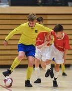 4 December 2018; Jonathan Houlihan of St. Louis Community School, Kiltimagh, Mayo, in action against Conor McGinty of St. Columba's College, Stranorlar, Donegal, during the Post-Primary Schools National Futsal Finals match between St. Louis Community School, Kiltimagh, Mayo and St. Columba's College, Stranorlar, Donegal at Waterford IT Sports Arena in Waterford. Photo by Eóin Noonan/Sportsfile