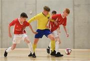 4 December 2018; Jonathan Houlihan of St. Louis Community School, Kiltimagh, Mayo, in action against Jack Long, left, and Ross Bradley of St. Columba's College, Stranorlar, Donegal, during the Post-Primary Schools National Futsal Finals match between St. Louis Community School, Kiltimagh, Mayo and St. Columba's College, Stranorlar, Donegal at Waterford IT Sports Arena in Waterford. Photo by Eóin Noonan/Sportsfile