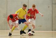 4 December 2018; Jonathan Houlihan of St. Louis Community School, Kiltimagh, Mayo in action against Jack Long, left, and Ross Bradley of St. Columba's College, Stranorlar, Donegal during the Post-Primary Schools National Futsal Finals match between St. Louis Community School, Kiltimagh, Mayo and St. Columba's College, Stranorlar, Donegal at Waterford IT Sports Arena in Waterford. Photo by Eóin Noonan/Sportsfile