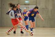 4 December 2018; Kate Carr of Ursuline secondary school, Thurles, Tipperary in action against Sophie O'Hagan of Coláiste Chiaráin, Leixlip, Kildare during the Post-Primary Schools National Futsal Finals match between Ursuline secondary school, Thurles, Tipperary and Coláiste Chiaráin, Leixlip, Kildare at Waterford IT Sports Arena in Waterford. Photo by Eóin Noonan/Sportsfile