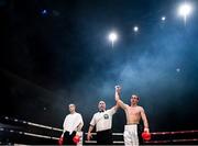 7 December 2018; Aaron Gethins is declared victorious following his welterweight contest with Silvije Kebet at The Royal Theatre in Castlebar, Mayo. Photo by Stephen McCarthy/Sportsfile