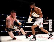 7 December 2018; Ray Moylette, left, is knocked to the canvas by Christian Uruzquieta during their vacant World Boxing Council International Silver Lightweight Title bout at The Royal Theatre in Castlebar, Mayo. Photo by Stephen McCarthy/Sportsfile