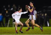 8 December 2018; Barry O'Connor of Wexford in action against Dan Corcoran of Louth during the O'Byrne Cup Round 1 match between Louth and Wexford at the Darver Louth Centre of Excellence in Louth. Photo by David Fitzgerald/Sportsfile