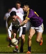 8 December 2018; James Craven of Louth in action against Paul Curtis of Wexford during the O'Byrne Cup Round 1 match between Louth and Wexford at the Darver Louth Centre of Excellence in Louth. Photo by David Fitzgerald/Sportsfile