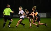 8 December 2018; Fiona Claffey of Foxrock-Cabinteely in action against Marie O'Callaghan, right, and Sandra Conroy of Mourneabbey during the All-Ireland Ladies Football Senior Club Championship Final match between Foxrock-Cabinteely, Dublin, and Mourneabbey, Cork, at Parnell Park in Dublin. Photo by Stephen McCarthy/Sportsfile