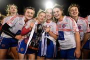 8 December 2018; Clontarf players celebrate with the cup following the All-Ireland Ladies Football Intermediate Club Championship Final match between Clontarf GAA and Emmet Óg at Parnell Park in Dublin. Photo by Stephen McCarthy/Sportsfile
