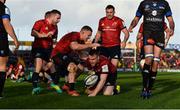 9 December 2018; Rory Scannell of Munster is congratulated by team-mates JJ Hanrahan, Andrew Conway, and Niall Scannell, after scoring his side's first try during the European Rugby Champions Cup Pool 2 Round 3 match between Munster and Castres at Thomond Park in Limerick. Photo by Diarmuid Greene/Sportsfile