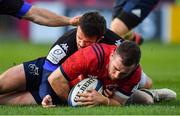 9 December 2018; JJ Hanrahan of Munster score his side's third try despite the tackle of Taylor Paris of Castres Olympique during the European Rugby Champions Cup Pool 2 Round 3 match between Munster and Castres at Thomond Park in Limerick. Photo by Brendan Moran/Sportsfile
