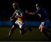 9 December 2018; PJ Scully of Laois in action against Shane Kinsella of Offaly during the Walsh Cup Round 1 match between Offaly and Laois at St Brendan's Park in Offaly. Photo by David Fitzgerald/Sportsfile