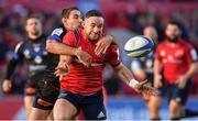 9 December 2018; Alby Mathewson of Munster is tackled by Yannick Caballero of Castres Olympique during the European Rugby Champions Cup Pool 2 Round 3 match between Munster and Castres at Thomond Park in Limerick. Photo by Brendan Moran/Sportsfile