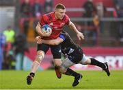 9 December 2018; Andrew Conway of Munster is tackled by Florian Vialelle of Castres Olympique during the European Rugby Champions Cup Pool 2 Round 3 match between Munster and Castres at Thomond Park in Limerick. Photo by Brendan Moran/Sportsfile