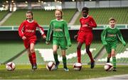 11 December 2018; SPAR, Ireland’s leading convenience retail group, and the Football Association of Ireland today announced a sponsorship agreement which will see SPAR renew as the Official Convenience Store of the FAI. The announcement took place at the Aviva Stadium with the Republic of Ireland’s new manager Mick McCarthy along with head coach of the Republic of Ireland Women's International Senior Team, Colin Bell in attendance. The partnership between SPAR and the FAI began in 2015 encompassing the Irish national football team and the hugely successful SPAR FAI Primary School 5s Programme. Pictured are, from left, Alex Carrick, age 12, from Clondalkin, Éabha Seery, age 12, from Clondalkin, Murphy Alade, age 11, from Irishtown, and Cameron Tormey, age 11, from Lucan, during the 2018 SPAR and FAI Sponsorship Renewal at the Aviva Stadium in Dublin. Photo by Seb Daly/Sportsfile