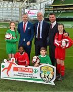 11 December 2018; SPAR, Ireland’s leading convenience retail group, and the Football Association of Ireland today announced a sponsorship agreement which will see SPAR renew as the Official Convenience Store of the FAI. The announcement took place at the Aviva Stadium with the Republic of Ireland’s new manager Mick McCarthy along with head coach of the Republic of Ireland Women's International Senior Team, Colin Bell in attendance. The partnership between SPAR and the FAI began in 2015 encompassing the Irish national football team and the hugely successful SPAR FAI Primary School 5s Programme. Pictured are, from left, Éabha Seery, age 12, from Clondalkin, SPAR Sales Director Colin Donnelly, Mick McCarthy, Republic of Ireland manager, Colin Bell, Republic of Ireland Women's National Team manager, Alex Carrick, age 12, from Clondalkin, Murphy Alade, age 11, from Irishtown, and Cameron Tormey, age 11, from Lucan, during the 2018 SPAR and FAI Sponsorship Renewal at the Aviva Stadium in Dublin. Photo by Seb Daly/Sportsfile