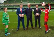 11 December 2018; SPAR, Ireland’s leading convenience retail group, and the Football Association of Ireland today announced a sponsorship agreement which will see SPAR renew as the Official Convenience Store of the FAI. The announcement took place at the Aviva Stadium with the Republic of Ireland’s new manager Mick McCarthy along with head coach of the Republic of Ireland Women's International Senior Team, Colin Bell in attendance. The partnership between SPAR and the FAI began in 2015 encompassing the Irish national football team and the hugely successful SPAR FAI Primary School 5s Programme. Pictured are, from left, Éabha Seery, age 12, from Clondalkin, SPAR Sales Director Colin Donnelly, Mick McCarthy, Republic of Ireland manager, Colin Bell, Republic of Ireland Women's National Team manager, and Murphy Alade, age 11, from Irishtown, during the 2018 SPAR and FAI Sponsorship Renewal at the Aviva Stadium in Dublin. Photo by Seb Daly/Sportsfile