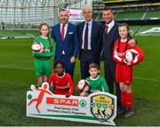 11 December 2018; SPAR, Ireland’s leading convenience retail group, and the Football Association of Ireland today announced a sponsorship agreement which will see SPAR renew as the Official Convenience Store of the FAI. The announcement took place at the Aviva Stadium with the Republic of Ireland’s new manager Mick McCarthy along with head coach of the Republic of Ireland Women's International Senior Team, Colin Bell in attendance. The partnership between SPAR and the FAI began in 2015 encompassing the Irish national football team and the hugely successful SPAR FAI Primary School 5s Programme. Pictured are, from left, Éabha Seery, age 12, from Clondalkin, SPAR Sales Director Colin Donnelly, Mick McCarthy, Republic of Ireland manager, Colin Bell, Republic of Ireland Women's National Team manager, Alex Carrick, age 12, from Clondalkin, Murphy Alade, age 11, from Irishtown, and Cameron Tormey, age 11, from Lucan, during the 2018 SPAR and FAI Sponsorship Renewal at the Aviva Stadium in Dublin. Photo by Seb Daly/Sportsfile