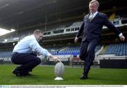 16 September 2003; Kieran McGeeney, Youth Sports Executive Sports Council, holds a rugby ball for Minister for Arts, Sport and Tourism, Mr. John O'Donohue T.D, at the announcment of a EUR 3.5 Million Irish Sports Council grant to the IRFU for participation initiatives at Lansdowne Road. Lansdowne Road, Dublin. Picture credit; David Maher / SPORTSFILE *EDI*