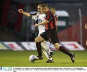 16 September 2003; Stephen Caffrey, Bohemians, in action against Drogheda United's Andy Myler. FAI Carlsberg Cup Quarter-Final replay, Bohemians v Drogheda United, Dalymount Park, Dublin. Picture credit; David Maher / SPORTSFILE *EDI*