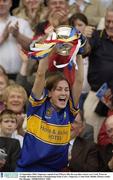 21 September 2003; Tipperary captain Una O'Dwyer lifts the cup after victory over Cork. Foras na Gaeilge All-Ireland Senior Championship Final, Cork v Tipperary, Croke Park, Dublin. Picture credit; Pat Murphy / SPORTSFILE *EDI*