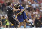 21 September 2003; Tipperary manager Ramie Ryan congratulates Jovita Delaney and Sinead Nealon, right, after victiory over Cork. Foras na Gaeilge All-Ireland Senior Championship Final, Cork v Tipperary, Croke Park, Dublin. Picture credit; Pat Murphy / SPORTSFILE *EDI*