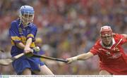 21 September 2003; Philly Fogarty, Tipperary, in action against Cork's Mary O'Connor. Foras na Gaeilge All-Ireland Senior Championship Final, Cork v Tipperary, Croke Park, Dublin. Picture credit; Ray McManus / SPORTSFILE *EDI*