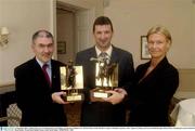 22 September 2003; Vodafone Director of Communications Tara Delaney presents the Vodafone GAA All Stars Players of the Month for August to Brendan Cummins, centre, Tipperary hurling, and Tyrone football manager Mickey Harte, accepting the award on behalf of Brian Dooher. Westin Hotel, Dublin. Picture credit; David Maher / SPORTSFILE *EDI*