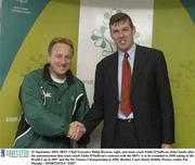 22 September 2003; IRFU Chief Executive Philip Browne, right, and team coach Eddie O'Sullivan shake hands after the announcement that team coach Eddie O'Sullivan's contract with the IRFU is to be extended to 2008 taking in the World Cup in 2007 and the Six Nations Championship in 2008. Berkeley Court Hotel, Dublin. Picture credit; Pat Murphy / SPORTSFILE *EDI*