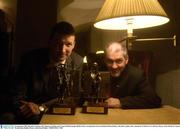 22 September 2003; Brendan Cummins, left, Tipperary hurling, and Tyrone football manager Mickey Harte, accepting the award on behalf of Brian Dooher, with their trophies after winning the Vodafone GAA All Stars Players of the Month for August. Westin Hotel, Dublin. Picture credit; David Maher / SPORTSFILE *EDI*