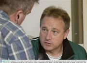 22 September 2003; Ireland team coach Eddie O'Sullivan is interviewed by a journalist after the announcement that his contract with the IRFU is to be extended to 2008 taking in the World Cup in 2007 and the Six Nations Championship in 2008. Berkeley Court Hotel, Dublin. Picture credit; Pat Murphy / SPORTSFILE *EDI*