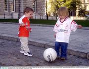 23 September 2003; Oisin O'Hagan, left, aged 2 from Armagh and Martha Rose McCamley, aged 2, from Tyrone during a photocall before Sunday's Bank of Ireland All-Ireland Senior Football Championship Final. City Hall, Belfast. Picture credit; David Maher / SPORTSFILE *EDI*