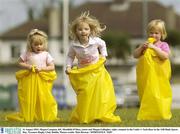 31 August 2003; Megan Campion, left, Meadhbh O'Shea, centre and Megan Gallagher, right, compete in the Under 4  Sack Race in the AIB Bank Sports Day, Terenure Rugby Club, Dublin. Picture credit; Matt Browne / SPORTSFILE *EDI*