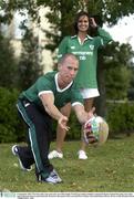 24 September 2003; The Irish rugby team took time out of their Rugby World Cup training schedule to launch the Repak National Recycling week with a rugby ball made from recycled materials. Pictured at the launch Irish scrum half Peter Stringer with model Roberta Rawat. Picture credit; Brendan Moran / SPORTSFILE *EDI*