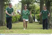 24 September 2003; The Irish rugby team took time out of their Rugby World Cup training schedule to launch the Repak National Recycling week with a rugby ball made from recycled materials. Pictured at the launch are Irish players Denis Hickie and Peter Stringer with model Roberta Rawat. Picture credit; Brendan Moran / SPORTSFILE *EDI*