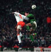 13 December 1995; Republic of Ireland's John Aldridge in action against Winston Bogarde, Netherlands. European Soccer Championship Qualifying Play-off, Anfield, Liverpool, England. Photo by David Maher/Sportsfile
