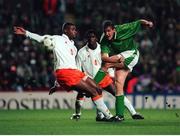 13 December 1995; Republic of Ireland's Tony Cascarino in action against Winston Bogarde (5) and Clarence Seedorf (4), Netherlands. European Soccer Championship Qualifying Play-off, Anfield, Liverpool, England. Photo by David Maher/Sportsfile