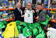 12 December 2018; FAI CEO John Delaney, left, along with Republic of Ireland Women’s National Team manager Colin Bell, right, were on hand today to hand over Ireland bags filled with jerseys, footballs, scarfs & other merchandise to Liam Casey, centre, East Region President, St Vincent De Paul, at the St Vincent De Paul depot on Sean McDermott Street, Dublin. The gifts are part of an annual Christmas donation for families in need. Photo by Seb Daly/Sportsfile