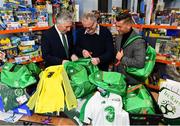 12 December 2018; FAI CEO John Delaney, left, along with Republic of Ireland Women’s National Team manager Colin Bell, right, were on hand today to hand over Ireland bags filled with jerseys, footballs, scarfs & other merchandise to Liam Casey, centre, East Region President, St Vincent De Paul, at the St Vincent De Paul depot on Sean McDermott Street, Dublin. The gifts are part of an annual Christmas donation for families in need. Photo by Seb Daly/Sportsfile