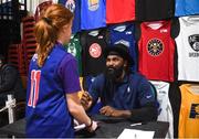 12 December 2018; Former NBA player Ronny Turiaf signs autographs during the Basketball Ireland Jr NBA Festival of Basketball at the National Basketball Arena in Tallaght, Dublin. Photo by David Fitzgerald/Sportsfile