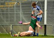 28 January 2018; Kieran Duffy of Monaghan attemps to help Diarmuid O’Connor of Mayo up during the Allianz Football League Division 1 Round 1 match between Monaghan and Mayo at St Tiernach's Park in Clones, County Monaghan. Photo by Seb Daly/Sportsfile