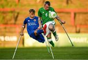 4 May 2018; Garry Hoey of Ireland in action against Jamie Tregaksiss of England during the Citywest Hotel EAFF Amputee Football Weeks Tournament match between Ireland and England at Dalymount Park in Dublin. Photo by Harry Murphy/Sportsfile