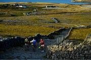 10 July 2018; Michael Fitzsimons of Dublin with the Sam Maguire Cup, along with Shane Enright of Kerry, left, and Damien Comer of Galway, make their way to the GAA Hurling and Football All Ireland Senior Championship Series National Launch at Dun Aengus in the Aran Islands, Co Galway. Photo by Brendan Moran/Sportsfile