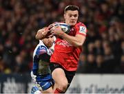 14 December 2018; Jacob Stockdale of Ulster on his way to scoring his side's second try despite the efforts of Tom Prydie of Scarlets during the Heineken Champions Cup Pool 4 Round 4 match between Ulster and Scarlets at the Kingspan Stadium, Belfast. Photo by Oliver McVeigh/Sportsfile