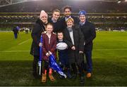 15 December 2018; Matchday mascot 5 year old Conor Ó Buachalla, from Kilmacud, Dublin, with Leinster players Nick mcCarthy and Joe Tomane ahead of the European Rugby Champions Cup Pool 1 Round 4 match between Leinster and Bath at the Aviva Stadium in Dublin. Photo by Ramsey Cardy/Sportsfile