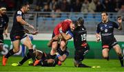 15 December 2018; Rory Scannell of Munster is tackled by Maama Vaipulu and Scott Spedding of Castres Olympique during the Heineken Champions Cup Pool 2 Round 4 match between Castres and Munster at Stade Pierre Fabre in Castres, France. Photo by Brendan Moran/Sportsfile